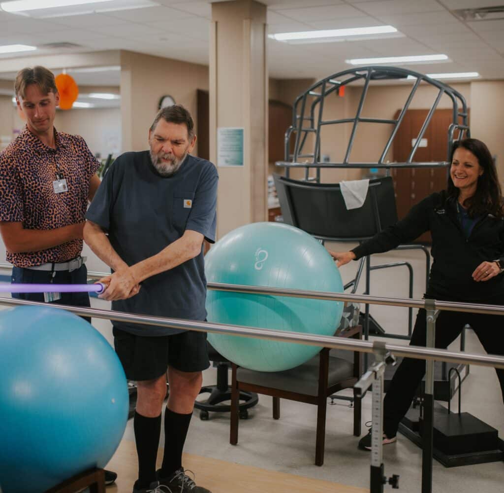 Patient working with therapist in Eaton Rapids rehabilitation