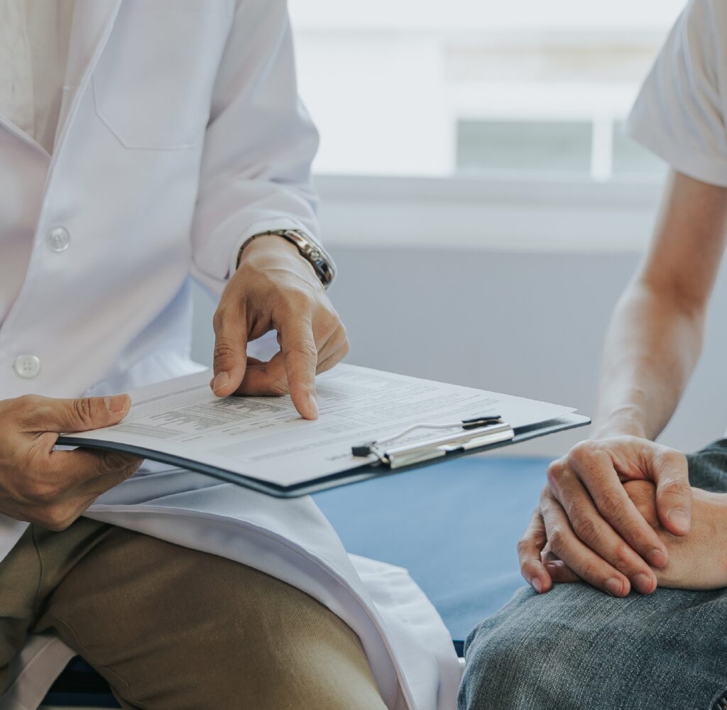 Urology care team member assisting patient in Eaton Rapids